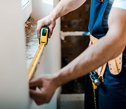Handyman with Measuring Tape