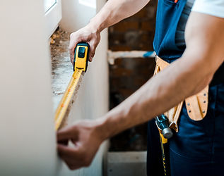 Handyman with Measuring Tape