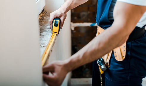 Handyman with Measuring Tape