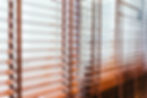 Wooden blinds against a window