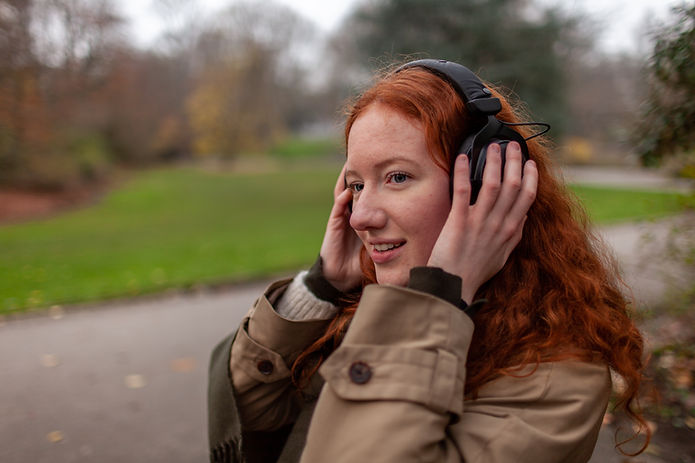 Woman Wearing Headphones