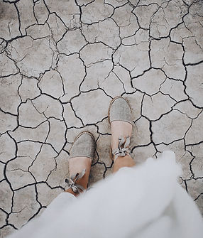 Feet On Cracked Earth