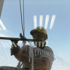 Window cleaner working on commercial property