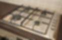 Modern integrated gas cooker in the kitchen