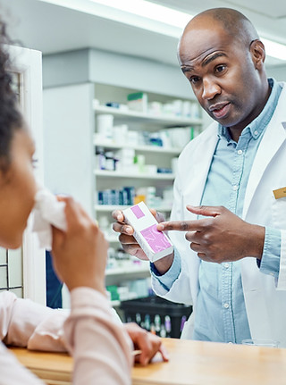 Pharmacist Assisting Customer