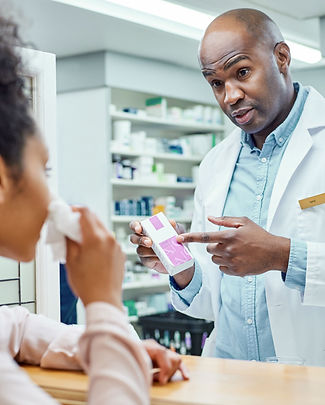 Pharmacist Assisting Customer