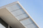 Modern exterior building roof with skylight panels.