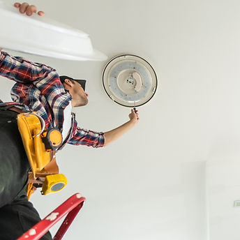 professional electrician in southern maine installing Ceiling Light