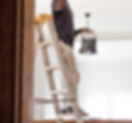 Man Painting Ceiling