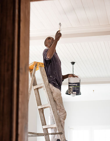 Man Painting Ceiling