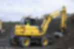 bulldozer, digger excavating earth and stone