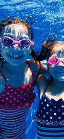 Kids Swimming Underwater