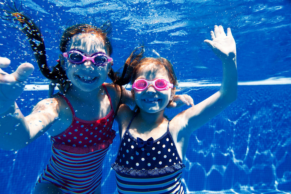 Kids Swimming Underwater