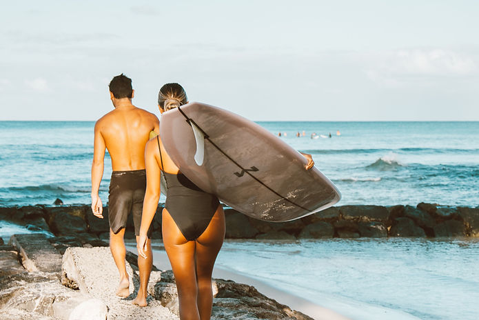 men and women surfing
