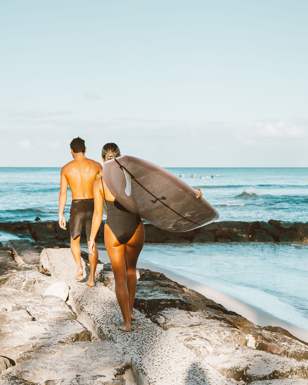 Surfers On Beach