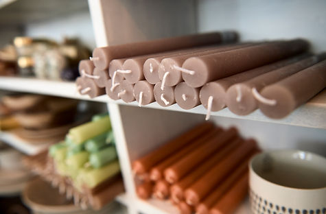 Long Candles on Shelf
