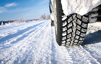 Car tire tracks on the snow
