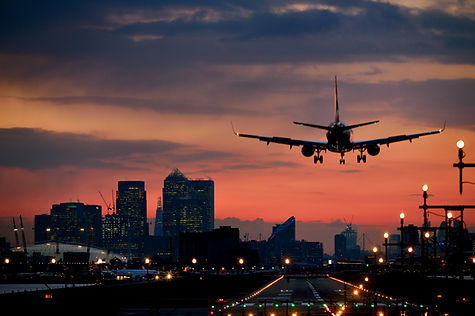 airplane landing at dusk