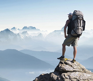 Hiker on Mountain Peak