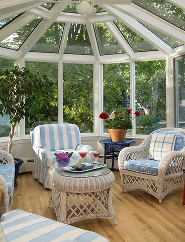 Conservatory interior with wicker furniture