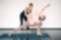 Yoga Teacher with Student