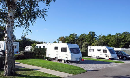 Caravan park with beautiful blue sky in the background