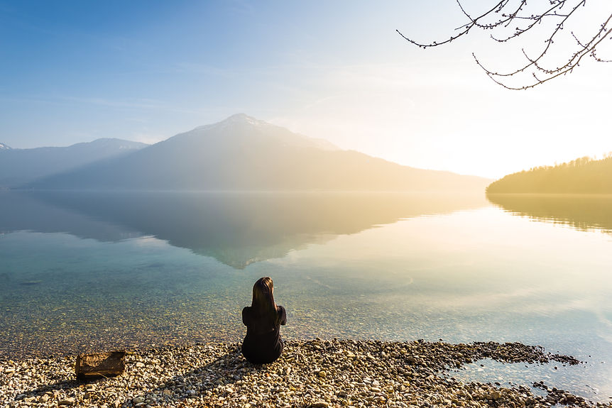 Sitting at a lake at sunset