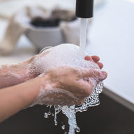 woman washing hands