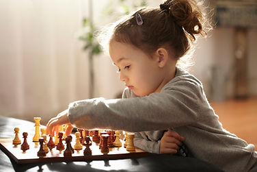 Child Playing Chess