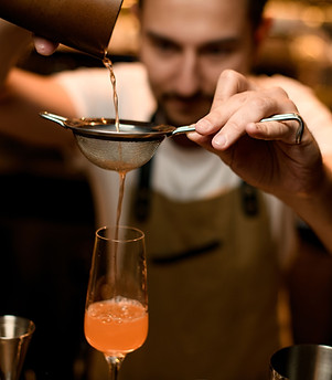 Mixologist Preparing a Drink