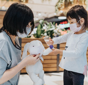 Mother and child sanitizing