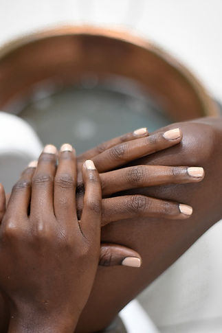 Manicured hands resting