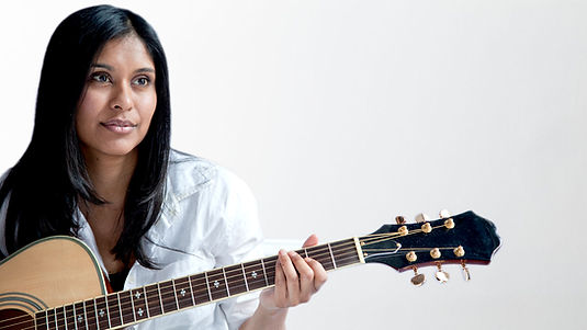 Woman Playing Guitar