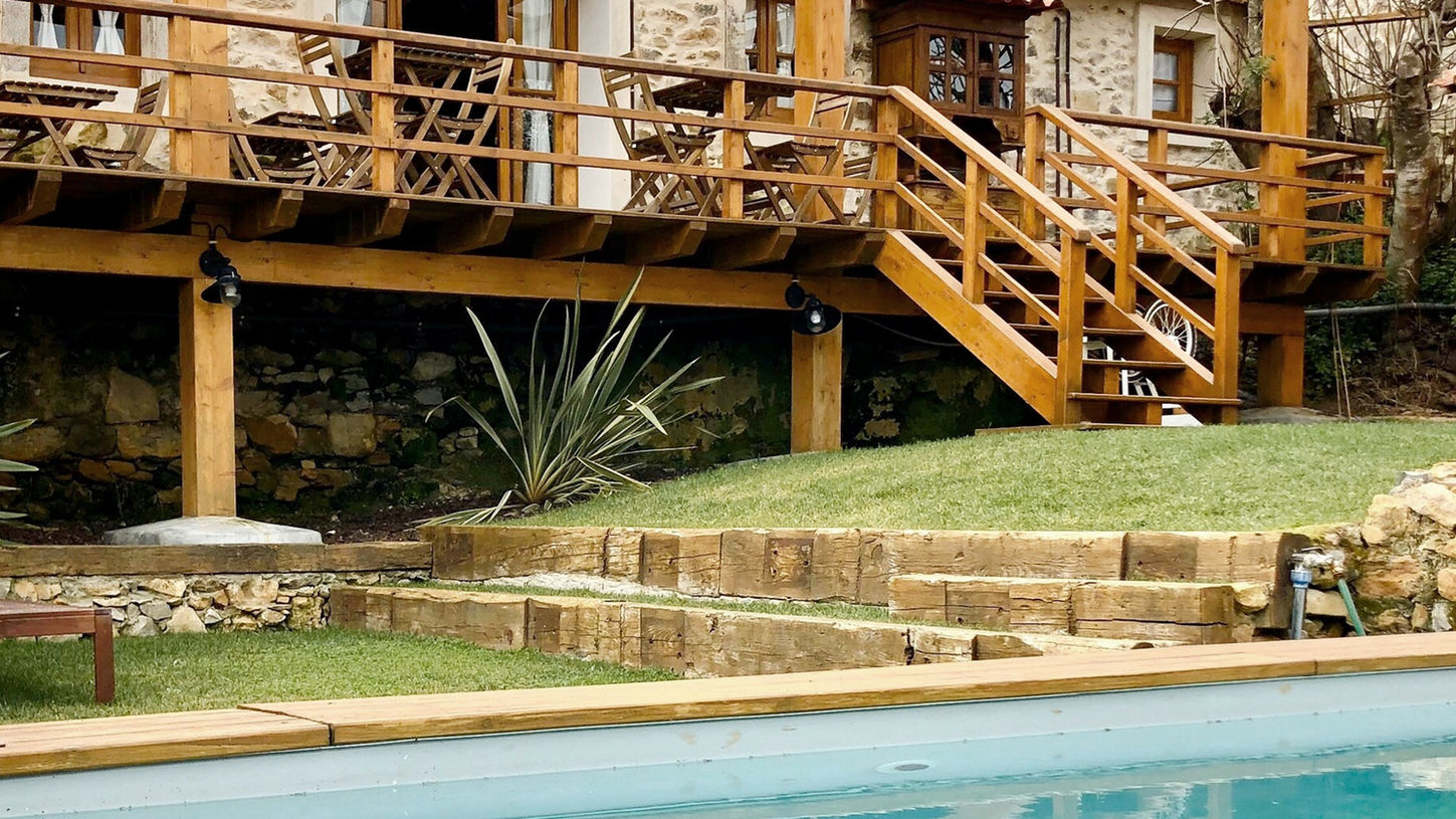 Wooden deck and pool at a serene estate