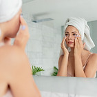 Woman Applying Eye Cream