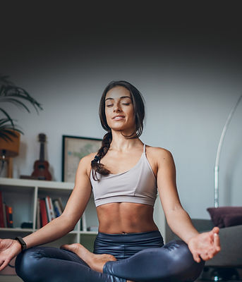 Woman Meditating Indoors