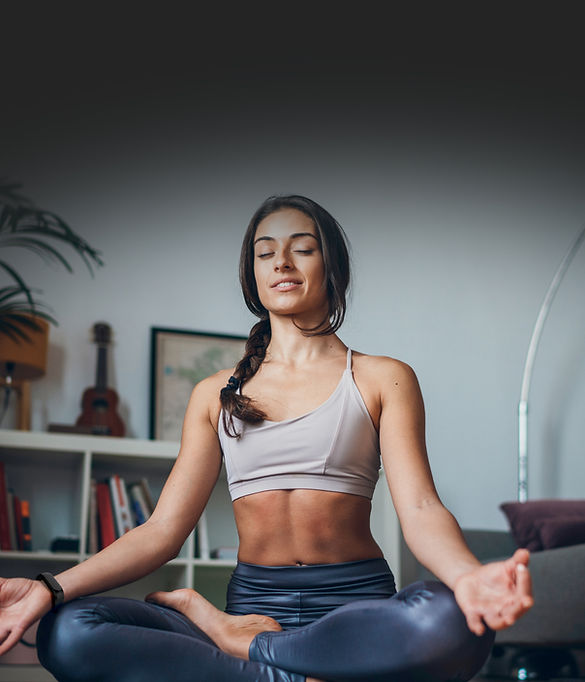 Woman Meditating Indoors