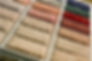 Colorful carpet swatch with a shallow depth of field and selective focus