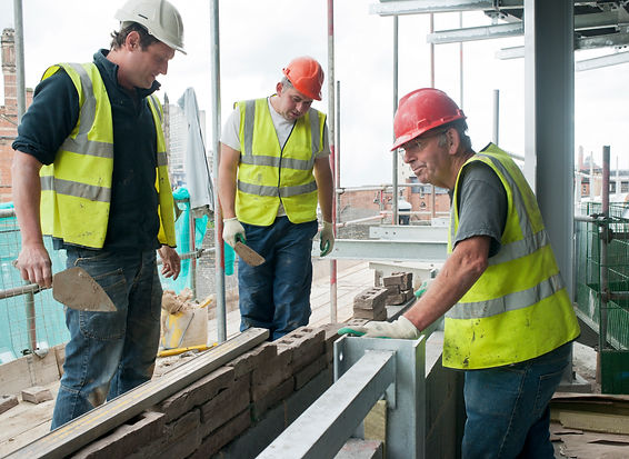 Bricklayers at work