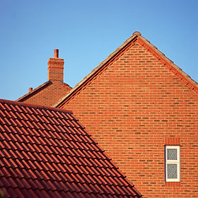 Brick house with tiled roof