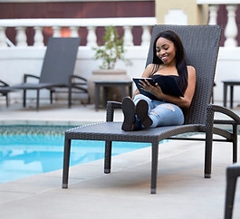 Using the Tablet by the Pool
