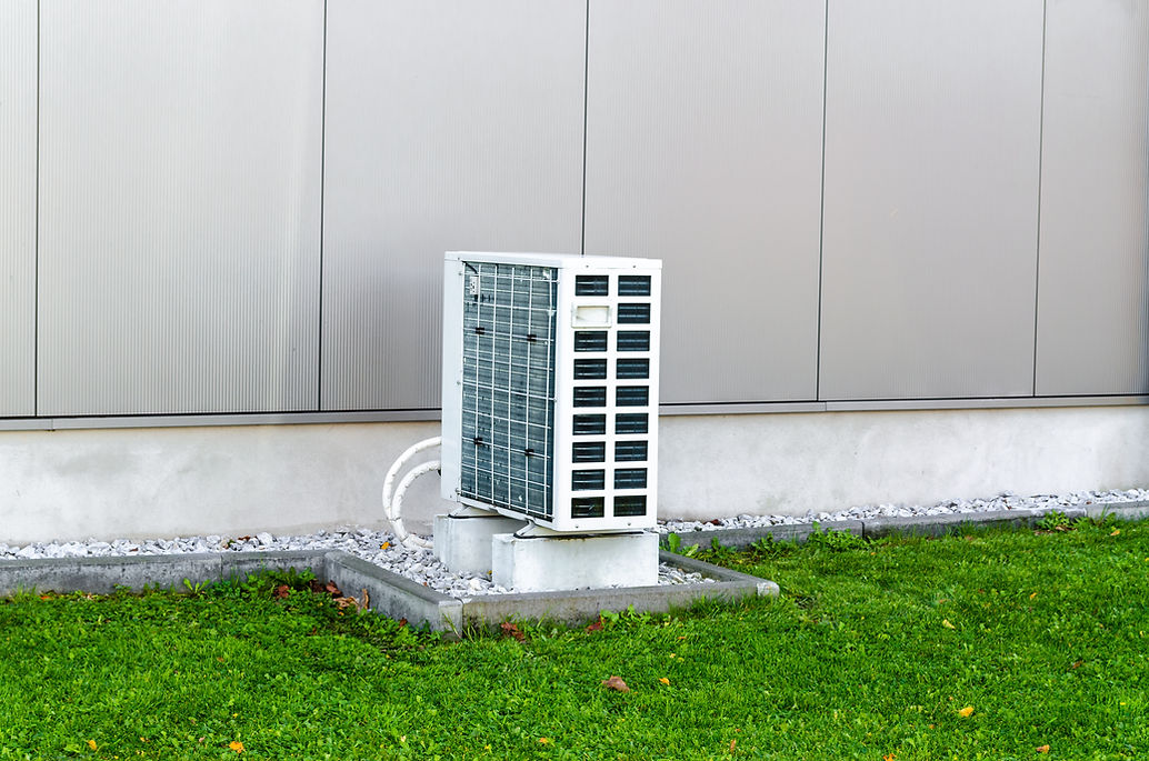 Air heat pump in a back garden