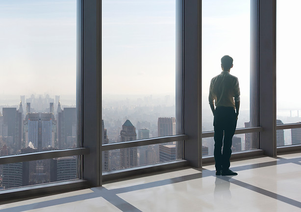 Man Overlooking Skyline