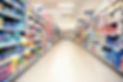 Grocery store interior, well-stocked shelves visible