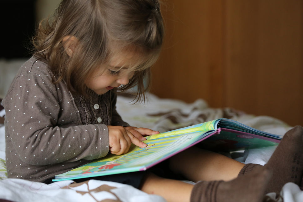 Child Reading Book