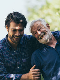 a father and son discussing tax planning
