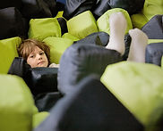 Boy Lying in Soft Cubes