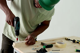 Man Using Drill