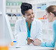 talking to Pharmacist assisting customer