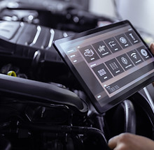 Car Mechanic with Tablet